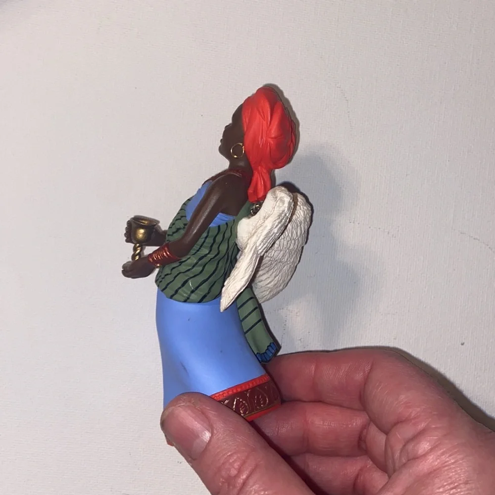 Vintage 1997 Hallmark Keepsake ornament from the A Celebration of Angels series.